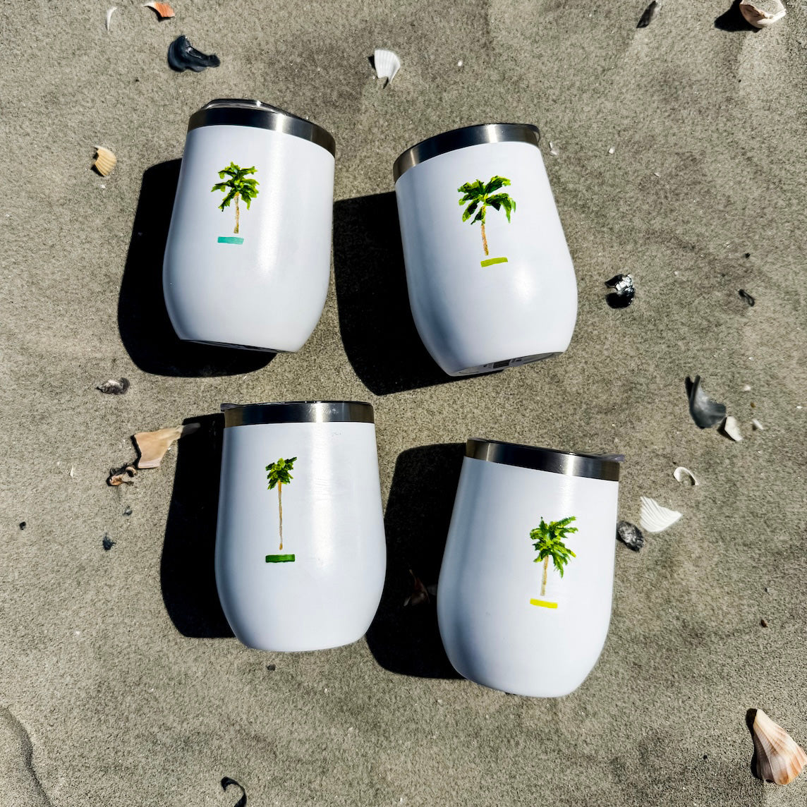Coastal wine tumbler with double-wall insulation and slide-top lid—keeps drinks cold for 12 hours with coastal charm.