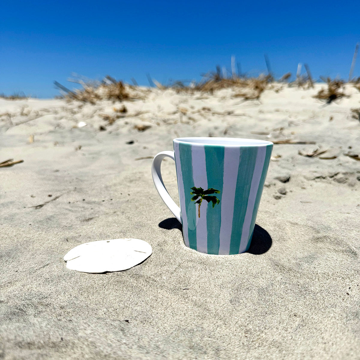 Ceramic latte mug with rounded corners and handle—12oz of comfort for your coffee routine.