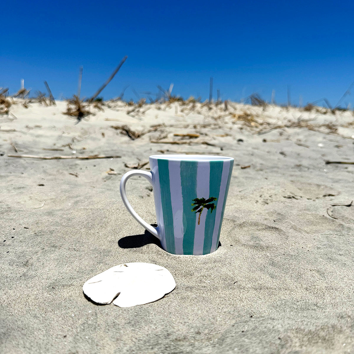 Ceramic latte mug with rounded corners and handle—12oz of comfort for your coffee routine.