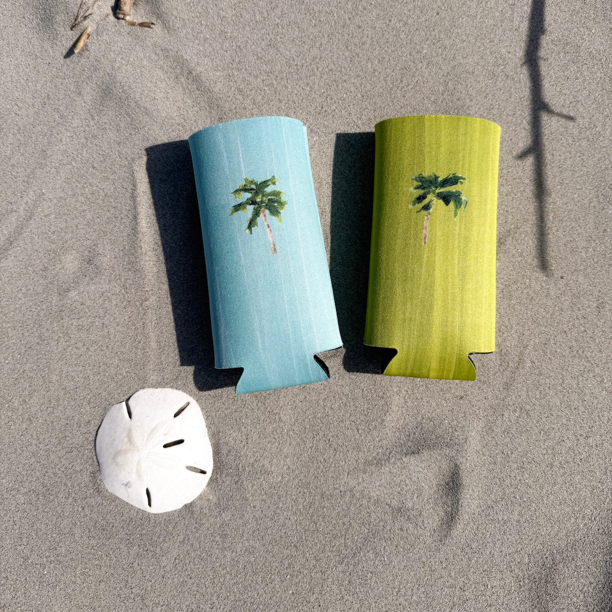Coastal slim can cooler fits slim 12oz cans. Keeps your drink chill and your vibe coastal.