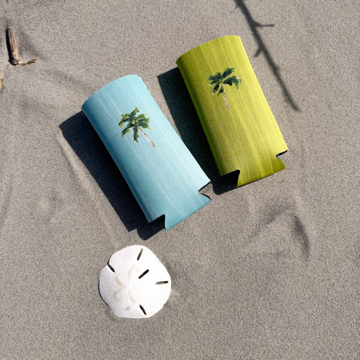 Coastal slim can cooler fits slim 12oz cans. Keeps your drink chill and your vibe coastal.