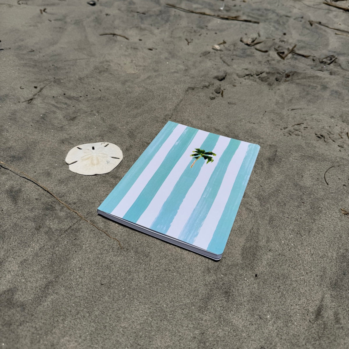 Softcover notebook with 100 lined pages and matte finish—perfect for everyday writing, travel notes, or your to-do list.