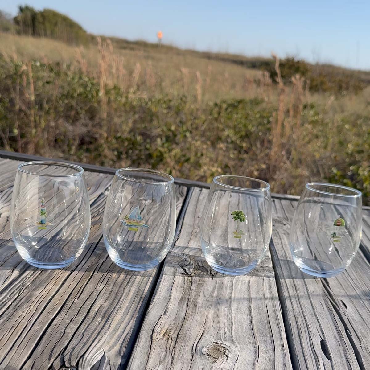 Coastal stemless wine glass holds 15 oz—coastal coastal design. Coastal Christmas wine glass.