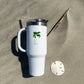 Insulated travel mug with coastal design is 40oz, double-wall stainless steel, and straw—keeps drinks cold or hot for hours.