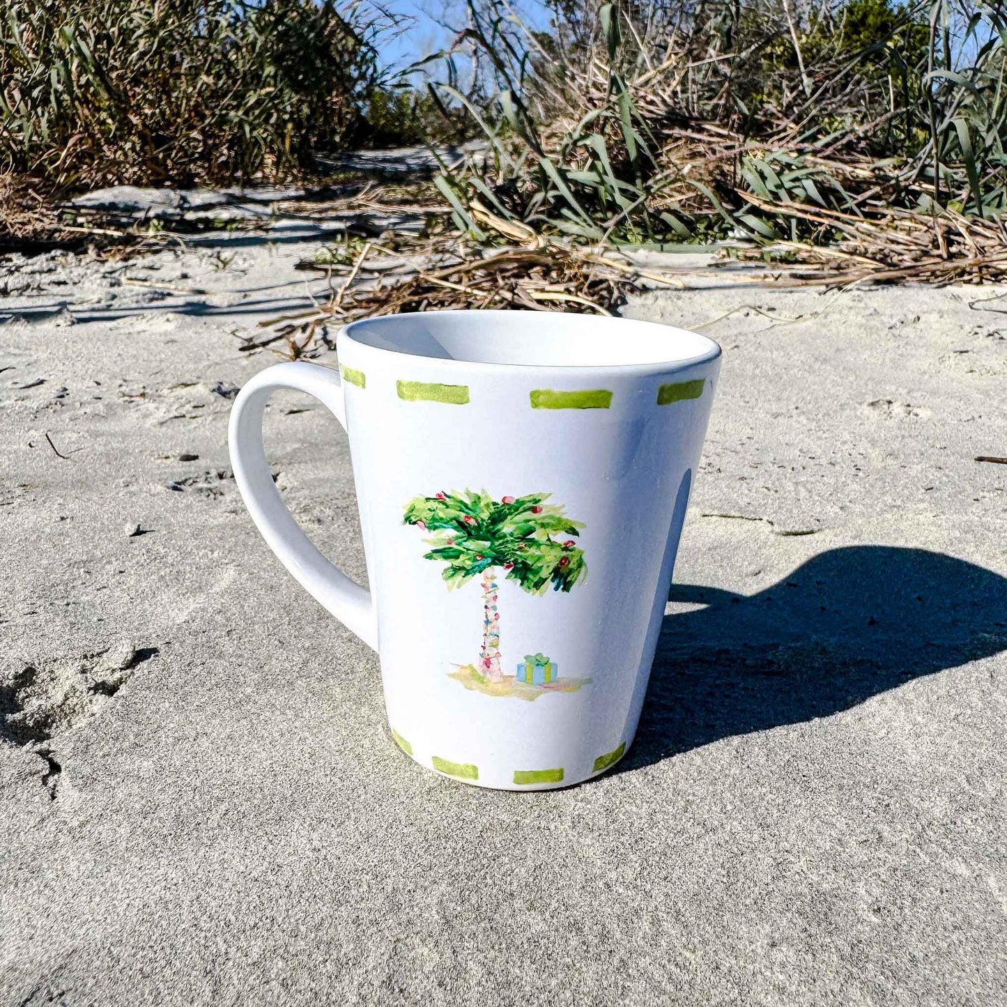 Ceramic latte mug with rounded corners and handle—12oz of comfort for your coffee routine. Coastal Christmas latte mug.