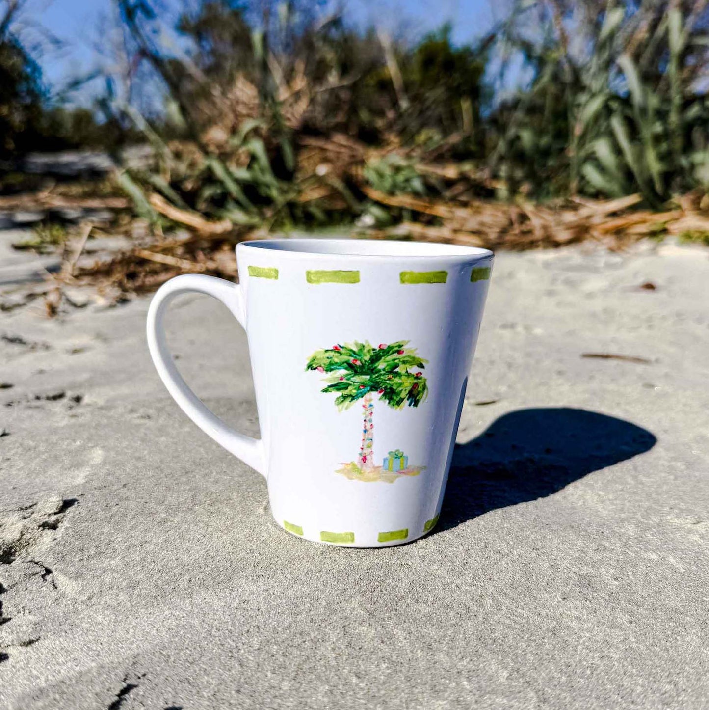 Ceramic latte mug with rounded corners and handle—12oz of comfort for your coffee routine. Coastal Christmas latte mug.