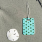 Coastal luggage tag in rectangle, 4” size with double-sided print—coastal style for easy bag spotting.