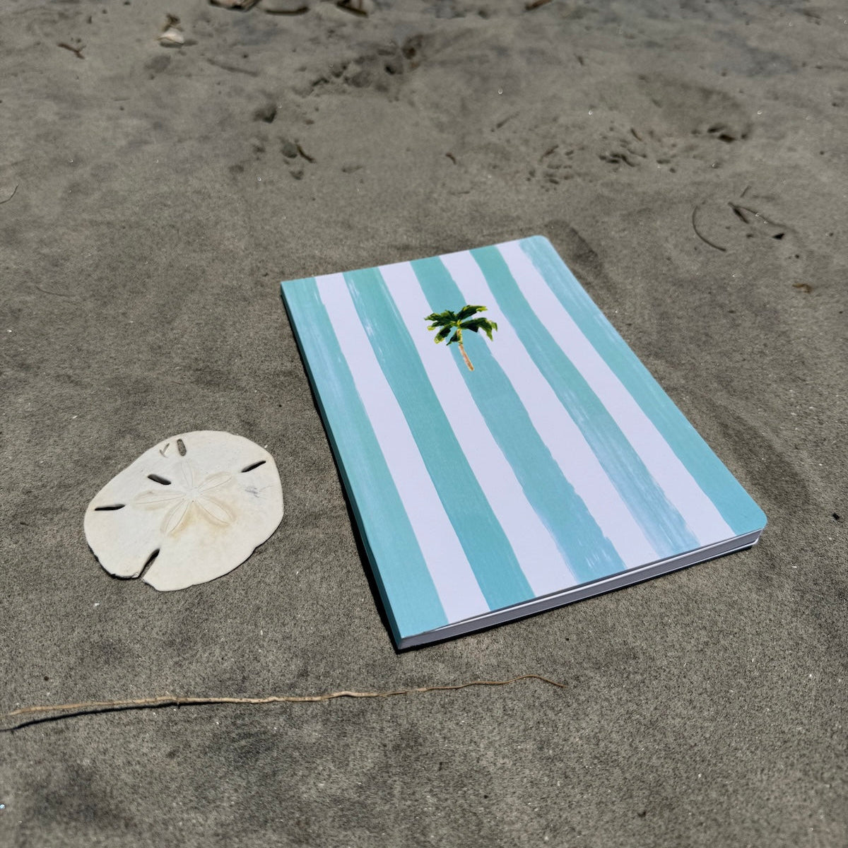 Softcover notebook with 100 lined pages and matte finish—perfect for everyday writing, travel notes, or your to-do list.