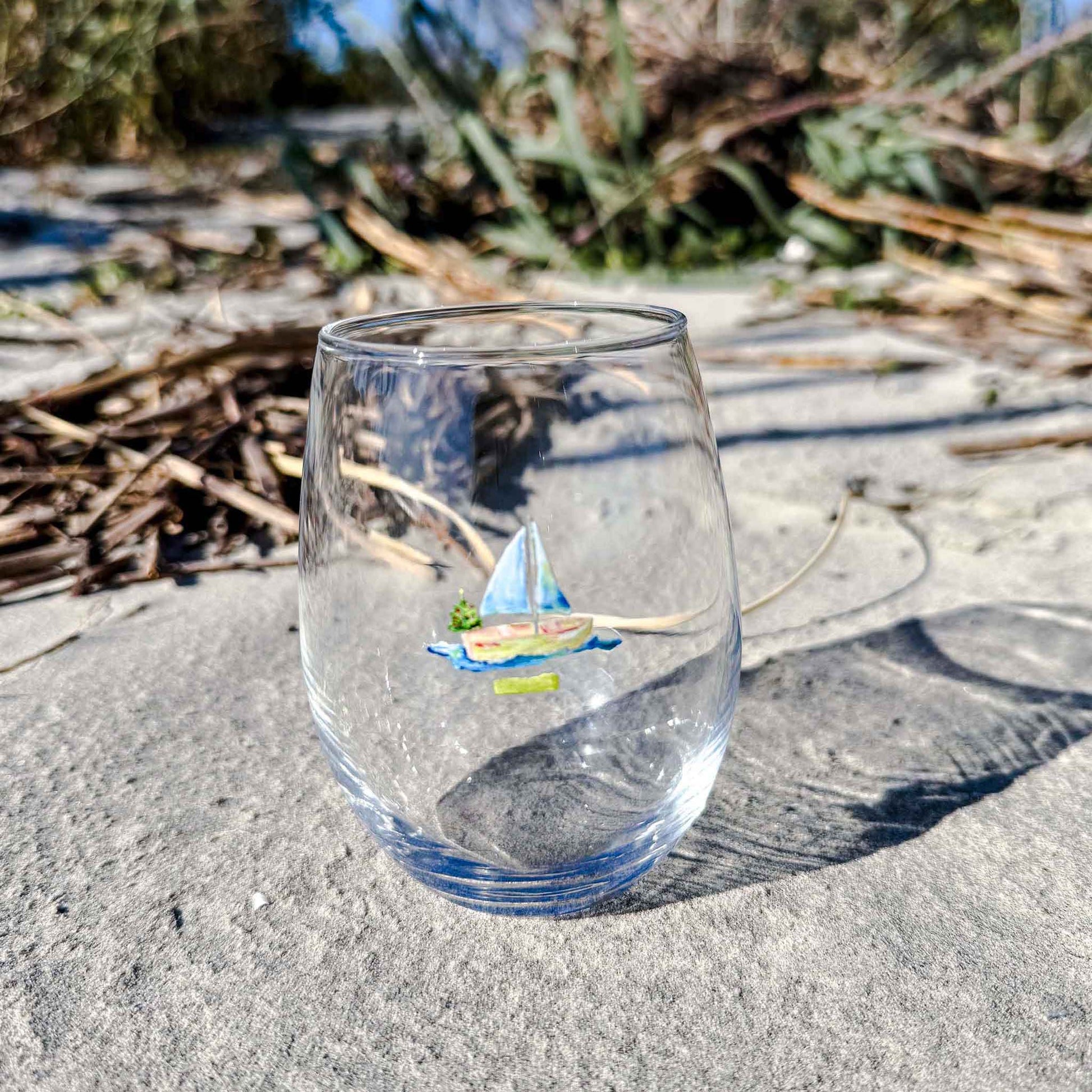 Coastal stemless wine glass holds 15 oz—coastal coastal design. Coastal Christmas wine glass.