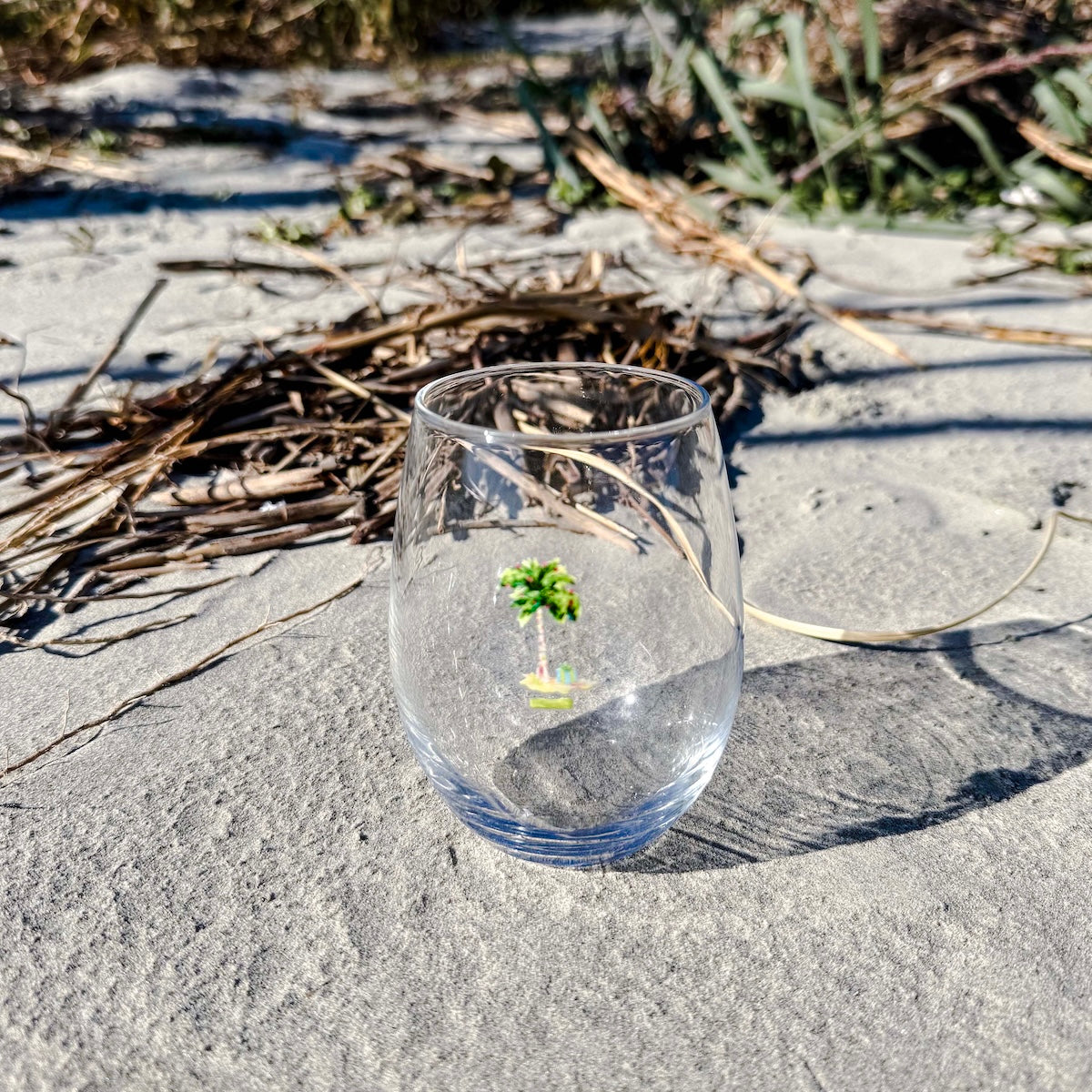 Coastal stemless wine glass holds 15 oz—coastal coastal design. Coastal Christmas wine glass.